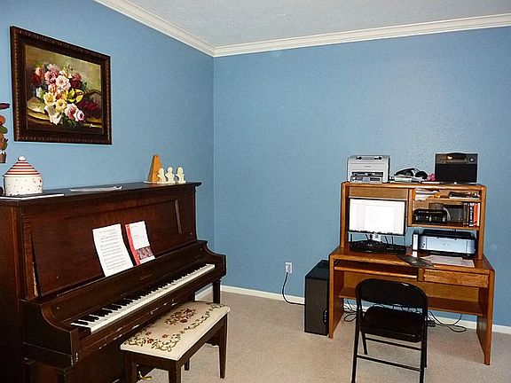 The formal living room would make an excellent study or downstairs play room.