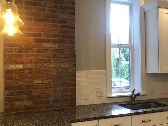 Exposed brick in kitchen