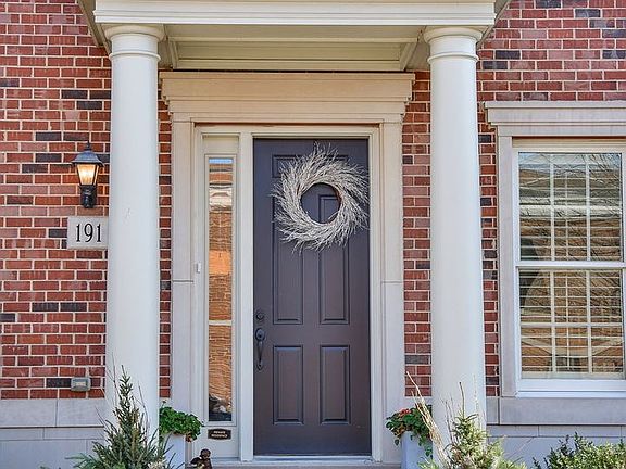 Private front entrance with brick paver walk-up