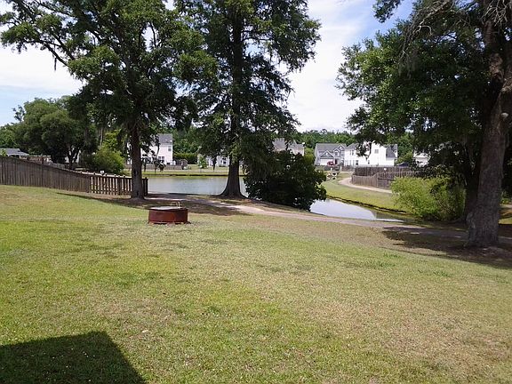 Back yard view of fishing pond