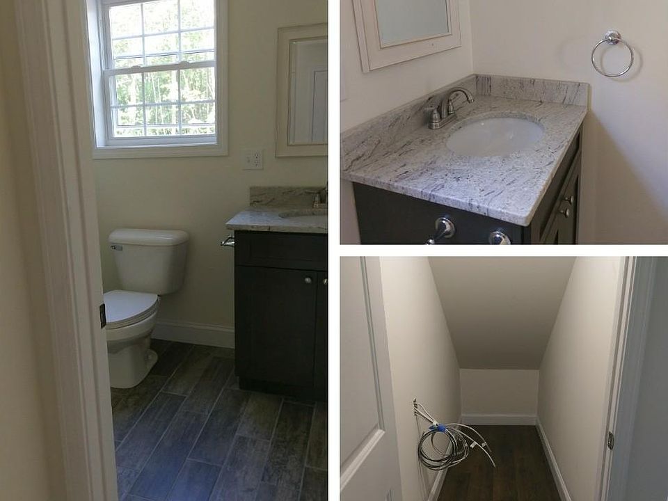 Downstairs half bath and under staircase storage closet