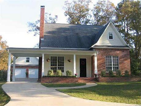 Front of house- own lot on either side of house