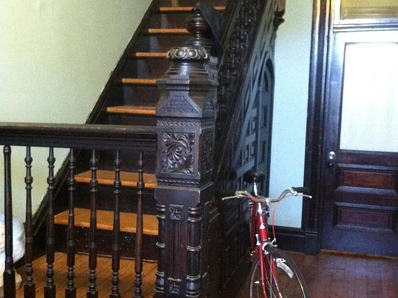 Front staircase leading to living room