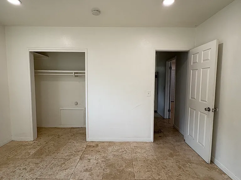 back bedroom with travertine flooring