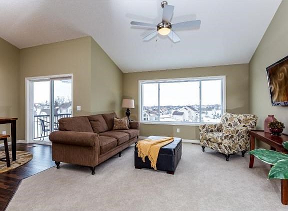 Entry views of the main level, vaulted ceilings, generous windows, great entertaining space.