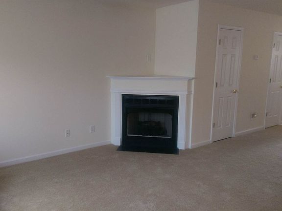 fresh paint and brand new carpet installed after seller relocated