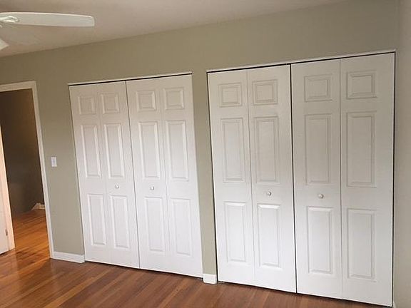 Master bedroom. All bedroom contain one double folding door closet. The master has 2 for his and hers.