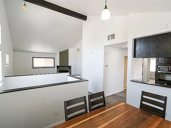 Dinning area with pass through to kitchen - great natural light