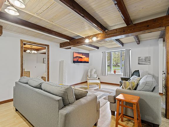 Main living area with comfortable seating and tv