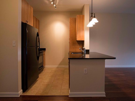 Gourmet Kitchen with Granite Countertops, Microwave, Dishwas