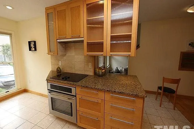 Custom cabinetry and built-in range