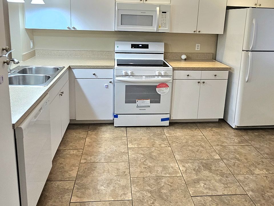 Kitchen, Never used Stove and Microwave. 
Refrigerator and dish washer and sink newly purchased.