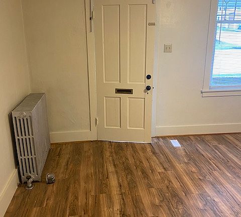 The picture shows the previous door. A new front door was installed.