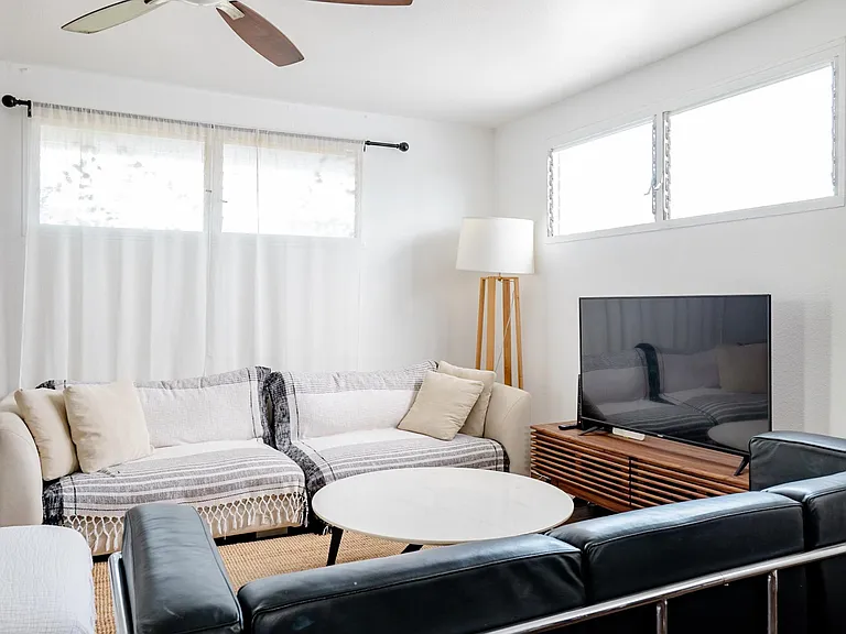 Gather around your cozy living room equipped with high powered air conditioning.