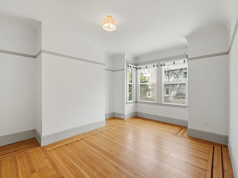 1st bedroom with view to the front of the unit