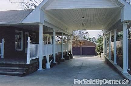 108 Cantrell Drive; Princeton, KY : Wooden deck breezeway w/fiberon railings. Ceiling fans provide c