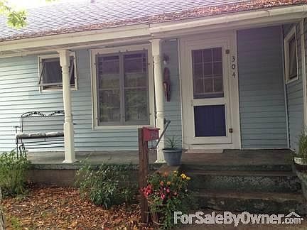 Blue House front porch view
						:
						Nice sized front porch to enjoy the birds and street view