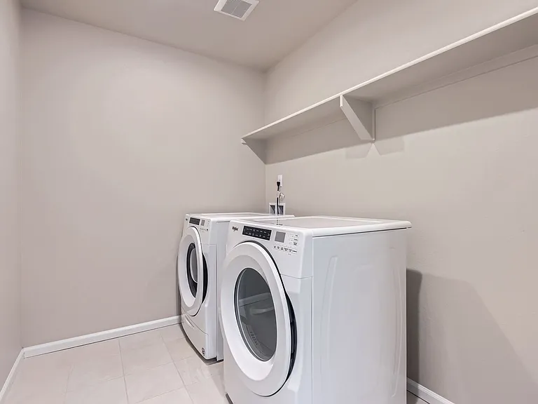 Laundry room with washer/dryer included