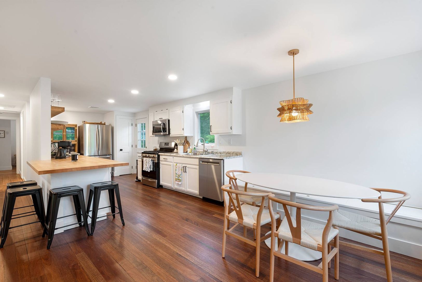  custom dining nook with built-in storage bench (which now have custom cushions and pillows)