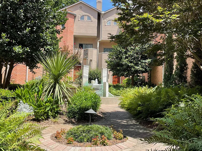 Gorgeous and serene courtyard for added privacy. Quiet community