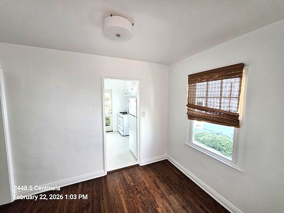 From the living room, you make your way into the dining room which leads to the kitchen.
