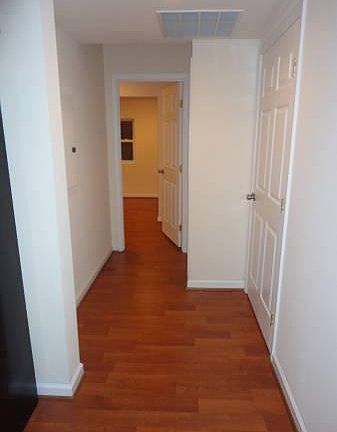 Hall way from living room and kitchen to bedroom