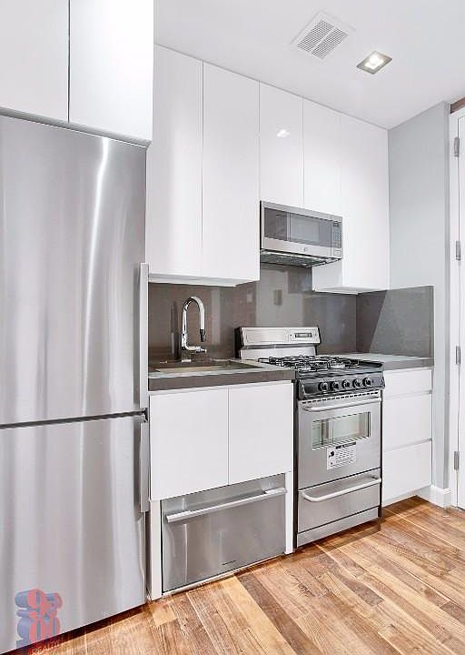 2nd image of 358 W 51st St APT Ag