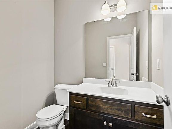 HALF BATH OFF KITCHEN/LIVING AREA