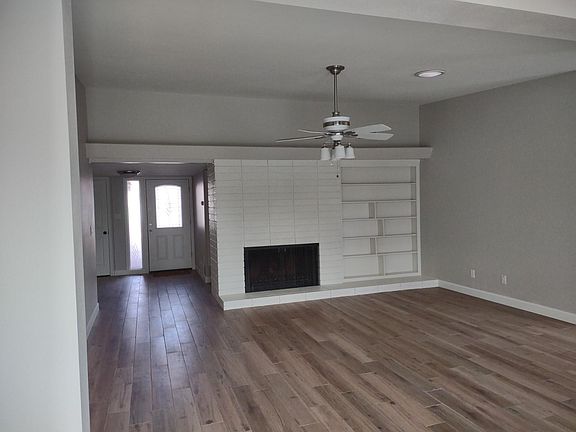 Wood burning fireplace and entry.