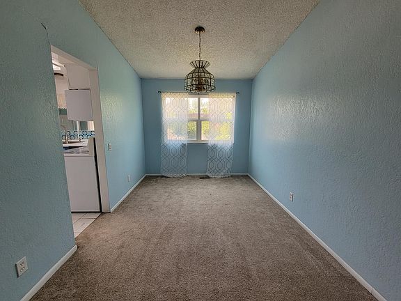 Dining room: behind kitchen & attached to front living room