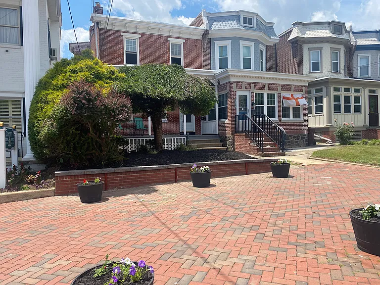 Quit end unit. Beautiful front landscape