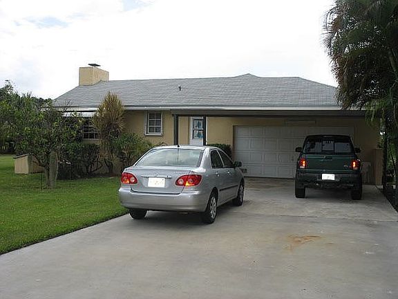 Driveway w/carport 2 car garage