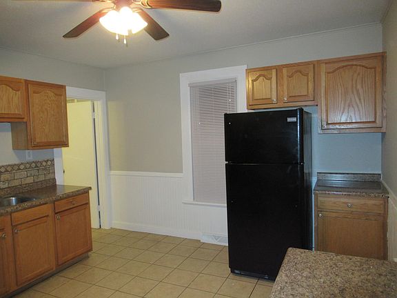 Kitchen view toward bathroom