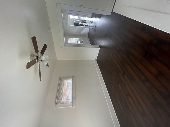 Hardwood floors and ceiling fan at The Villas Apartments in Pasadena, CA.