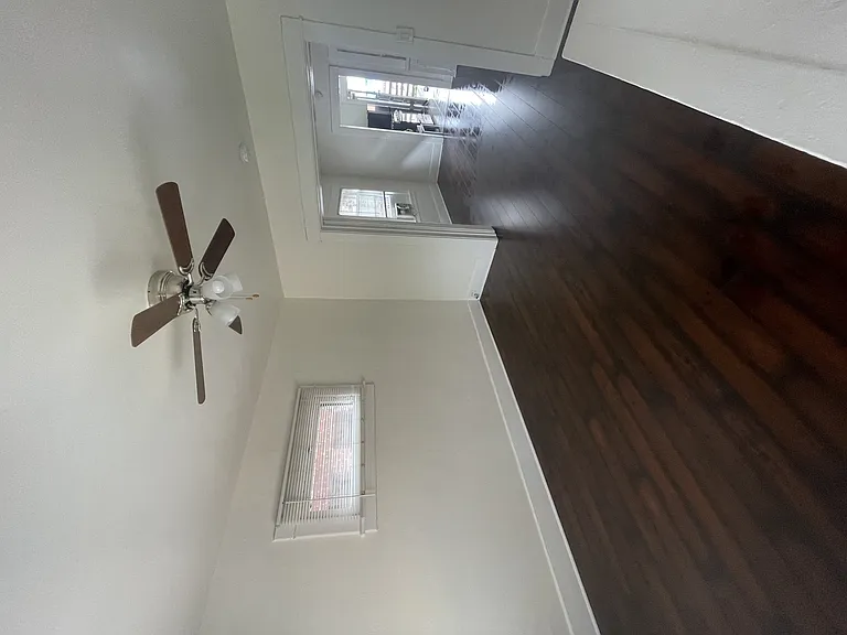 Hardwood floors and ceiling fan at The Villas Apartments in Pasadena, CA.