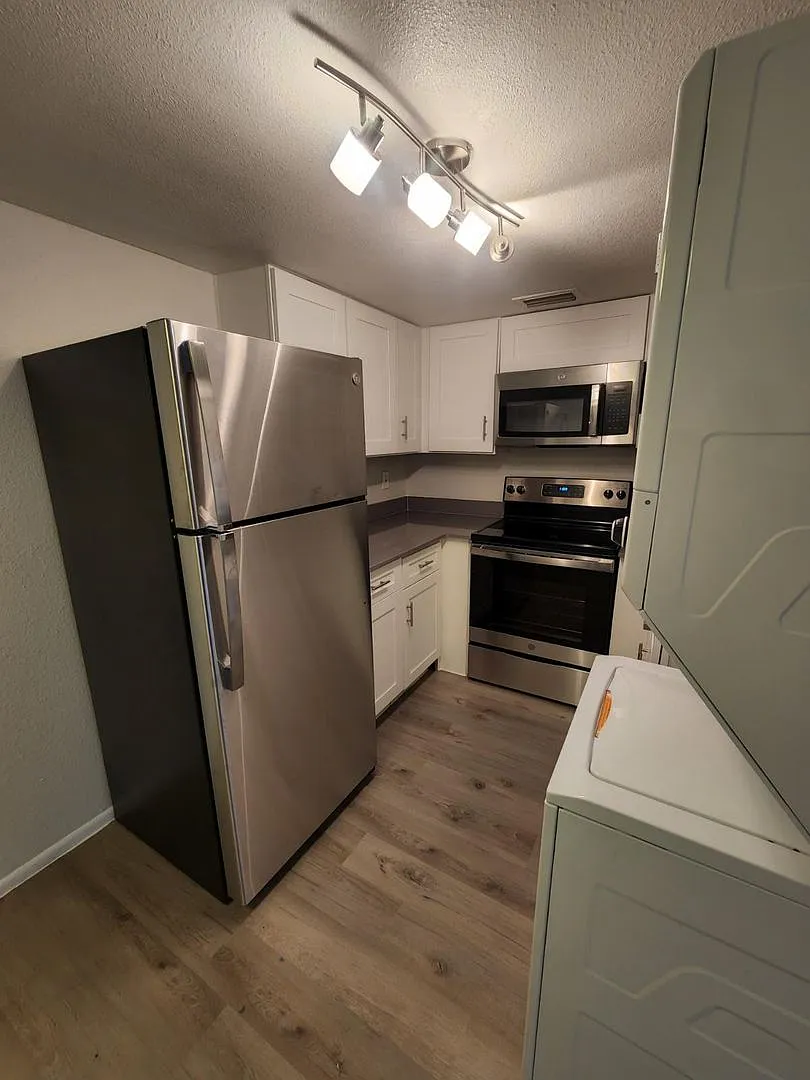 Building Photo - Modern Quarters Apartments