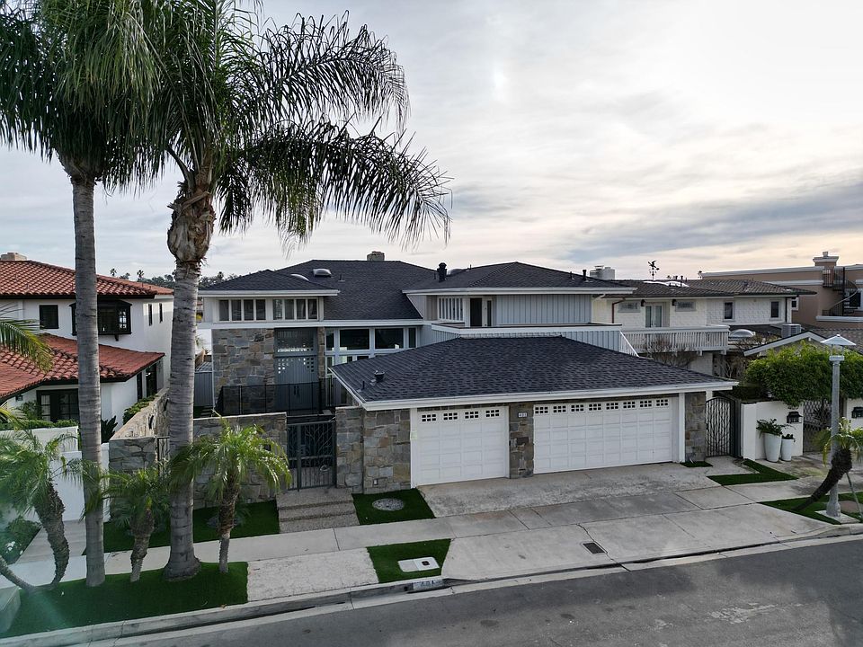 Located on Cul de Sac Street with Private Courtyard & 3 car Attached Garage