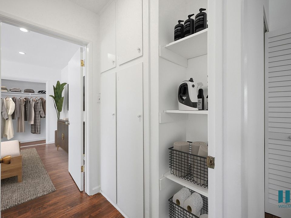 Hallway with Built-In Cabinet Storage and Shelving