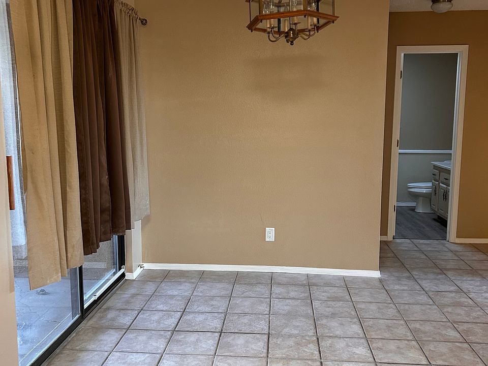 Dining room with patio doors off to the left side.