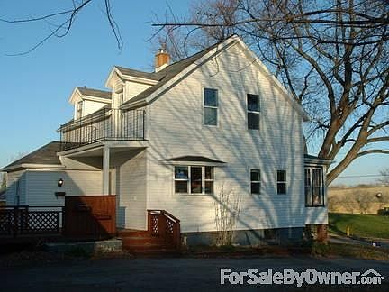 South side of house.
						:
						Plenty of south facing windows. It is always bright and sunny inside.
