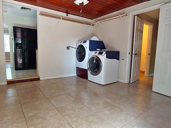 Laundry room in back