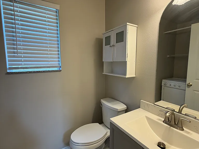 2nd level - 1/2 bath + utility room