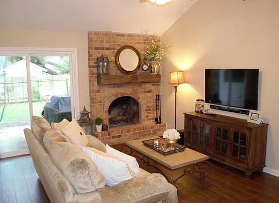 This house is beautiful inside and out. Approximately 1300 SF, corner lot, side entry garage.
