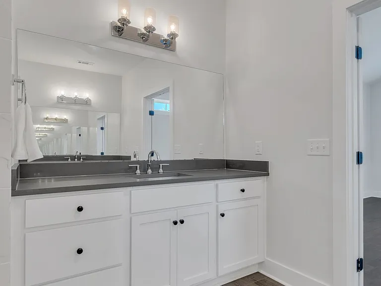 Primary Suite #2 (upstairs) - two vanities.