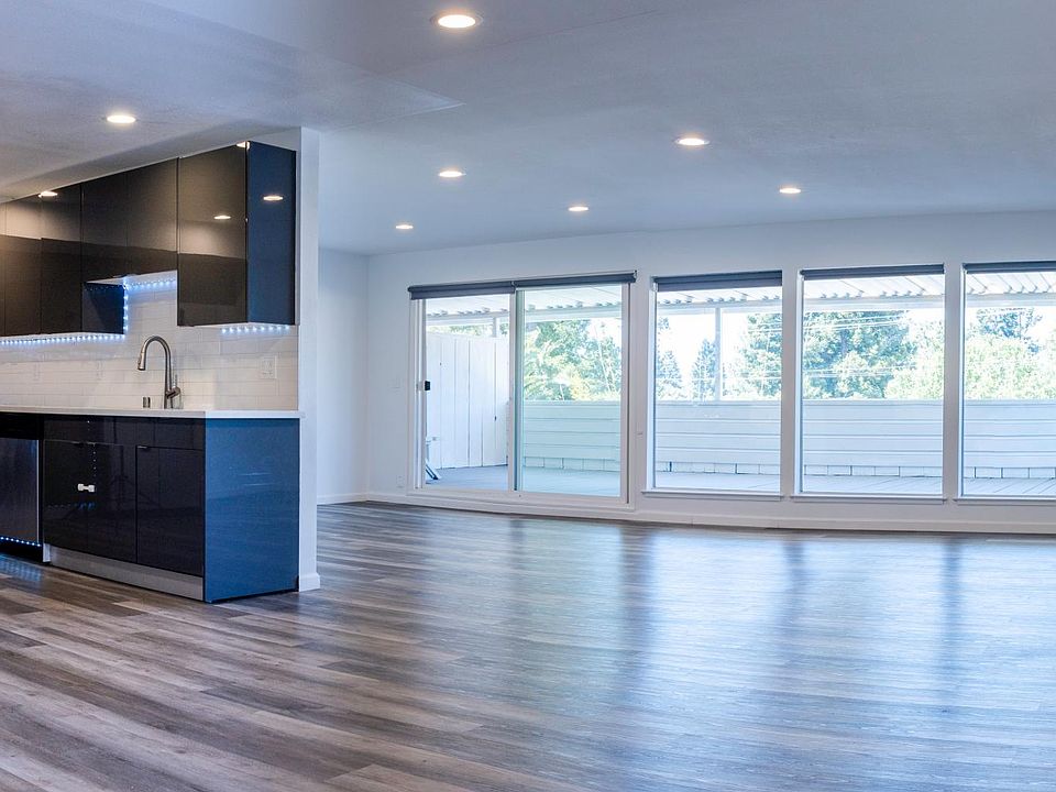 Open concept kitchen, dining room, and living space with large private covered terrace.