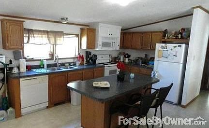 Kitchen
						:
						Nice dishwasher, cathedral ceilings, open space.