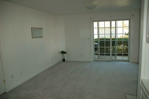Living room with private patio