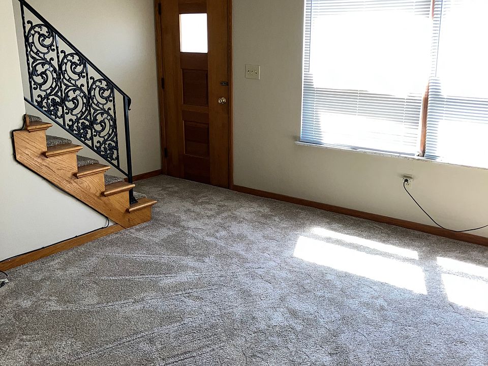 Freshly painted living room with new carpeting...
