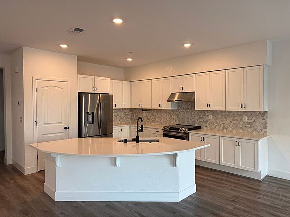 5th image of 5301 E Commerce Way Unit 23102