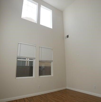 High ceiling entrance, living room